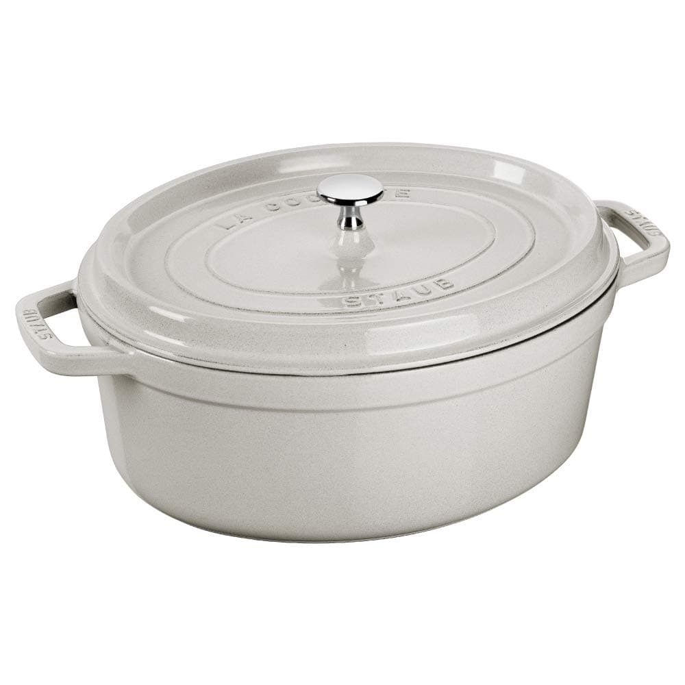 Oval Cocotte 29cm White 4.2L Cast Iron Material Matte black inner enamel. Lid with Aroma Rain Structure. Suitable for all types of hobs, incl. induction. Ovensafe. Grill Safe.