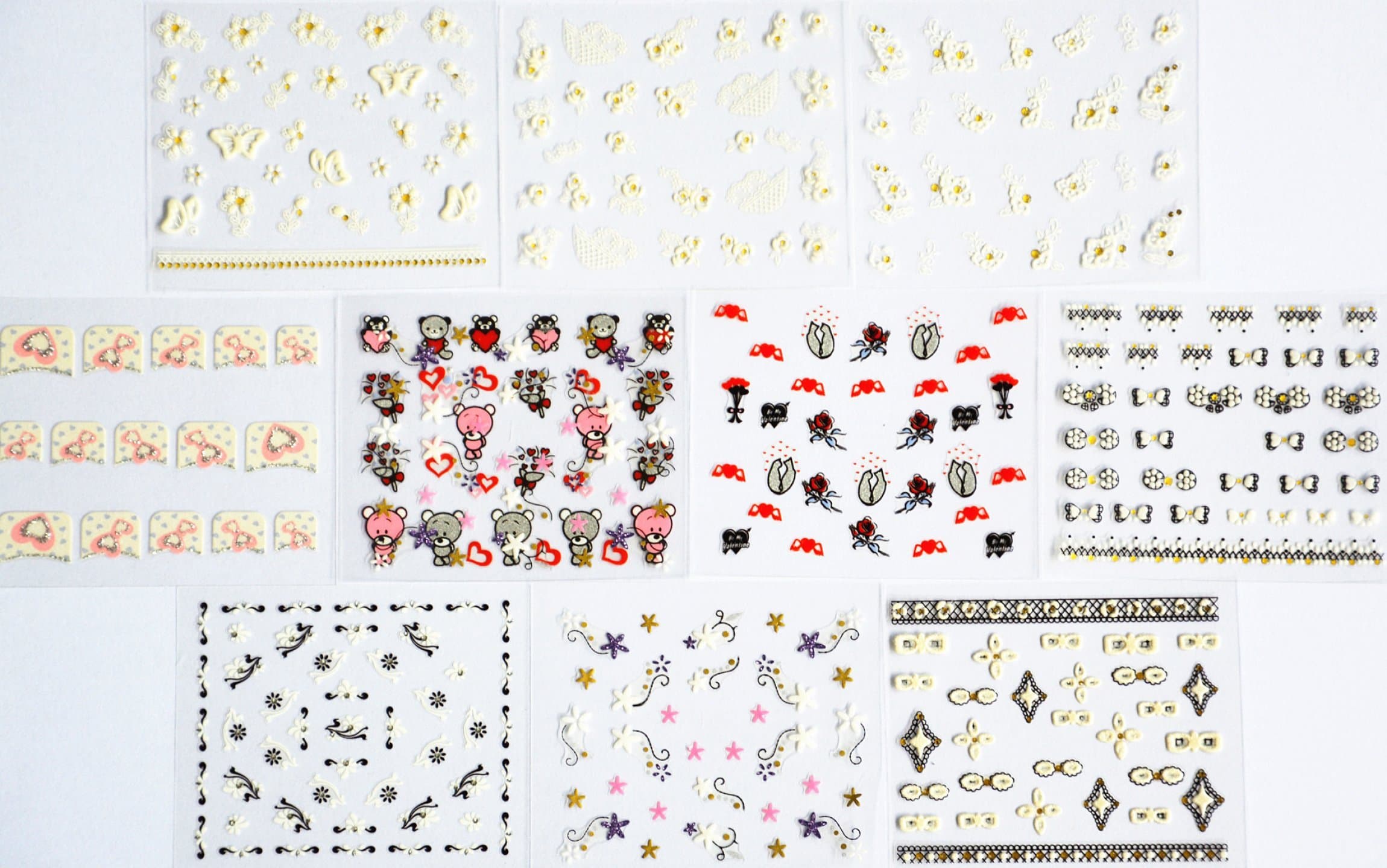 10pcs/package nail stickers decals multi mix designs including white flowers with gold/french semi-paste nail decals/black and white flowers/black and white laces/colorful flowers/red roses/glitter bears/etc.