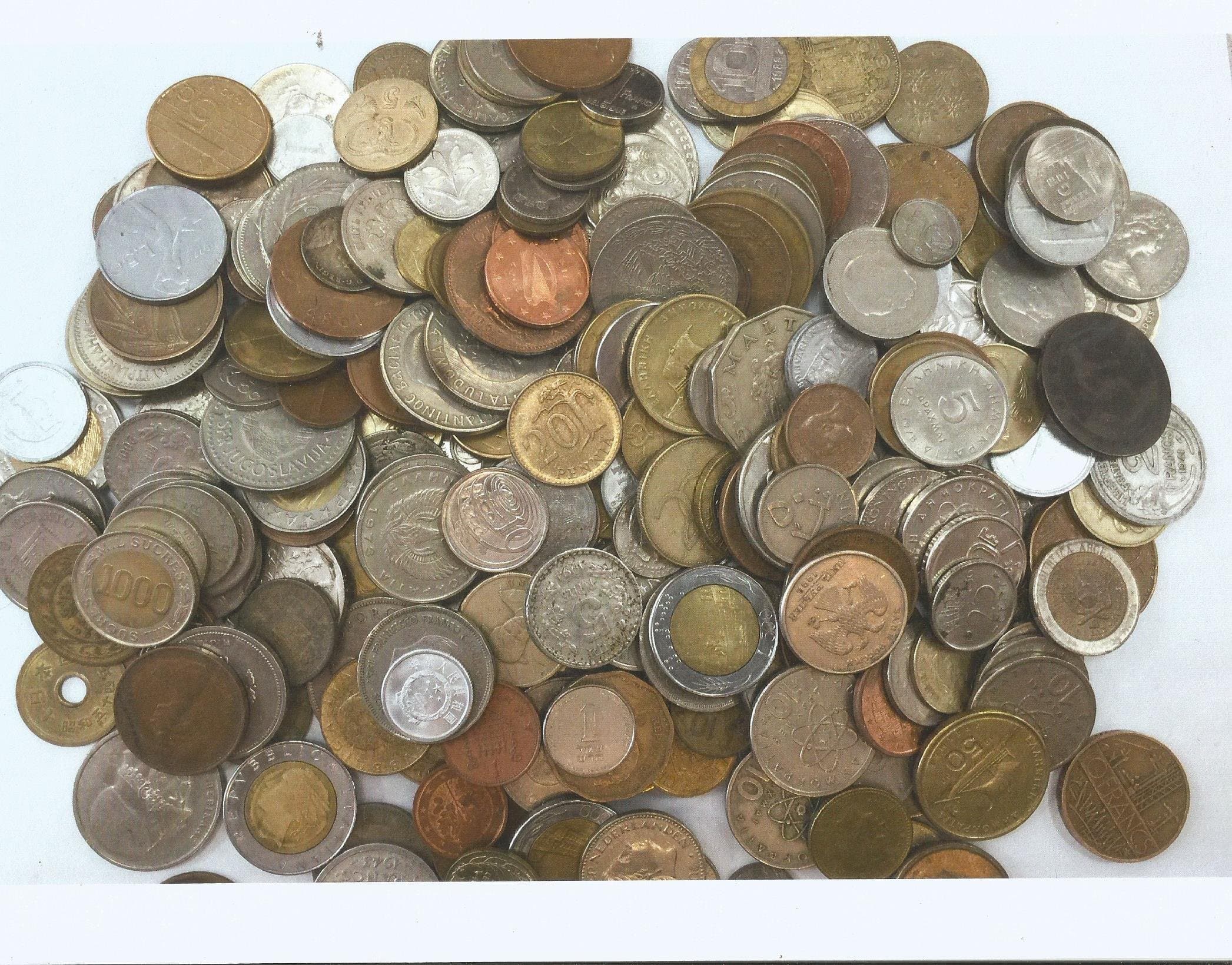 10 Different old world coins from around the globe